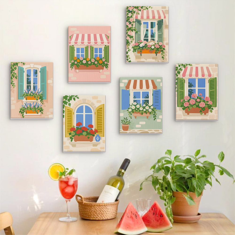Six finished Flower Box Windows mini paintings hung on a wall above a table