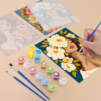 Filling in a Flower Crowned Beauties mini canvas with numbered acrylic paints and a fine brush