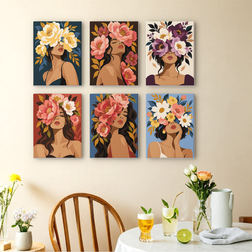 Flower Crowned mini paintings displayed as a gallery wall in a sunny kitchen