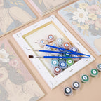 Numbered paint pots and brushes on a pre-stretched Flower Crowned mini canvas