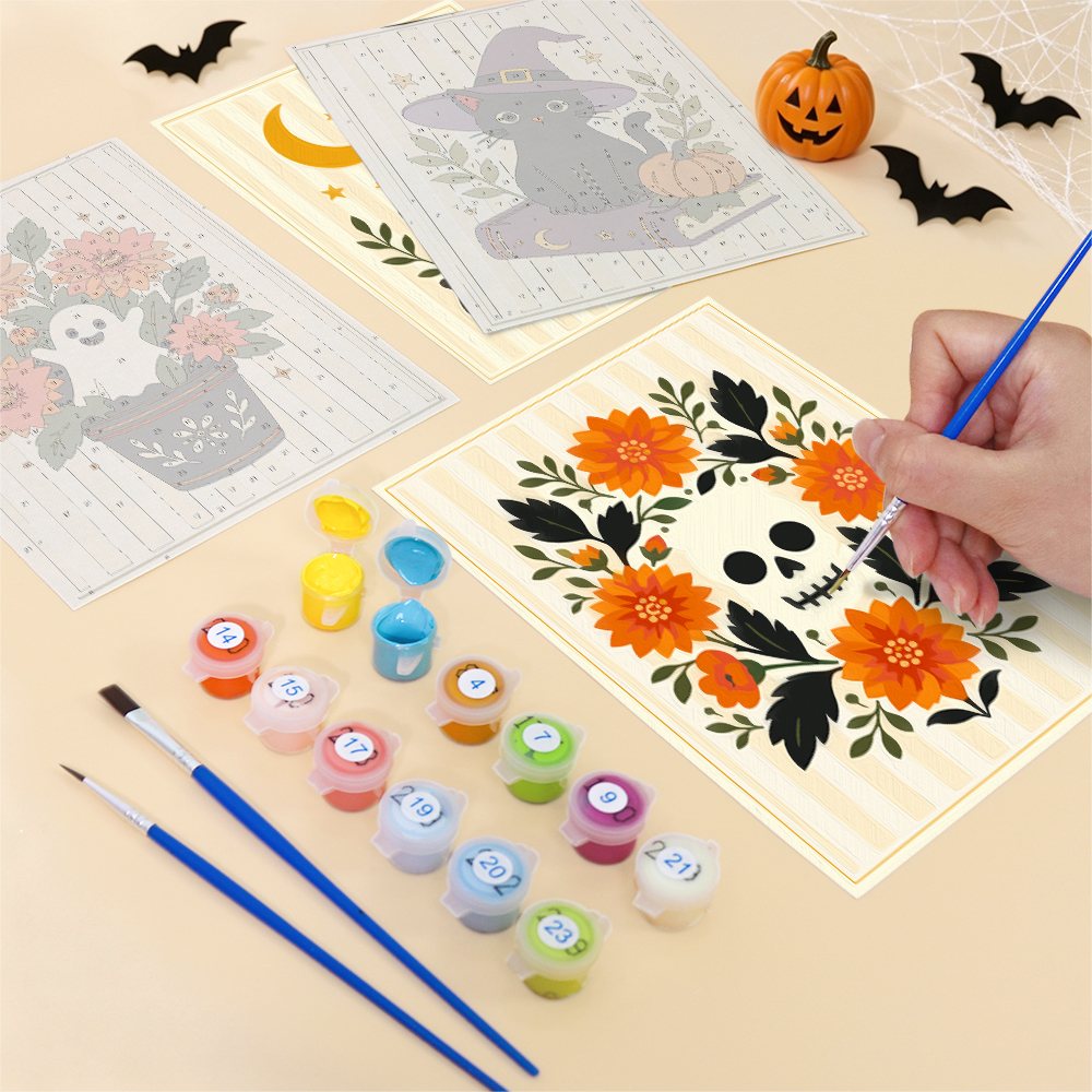 Filling in a Folk Art Halloween mini canvas with numbered acrylic paints and a fine brush