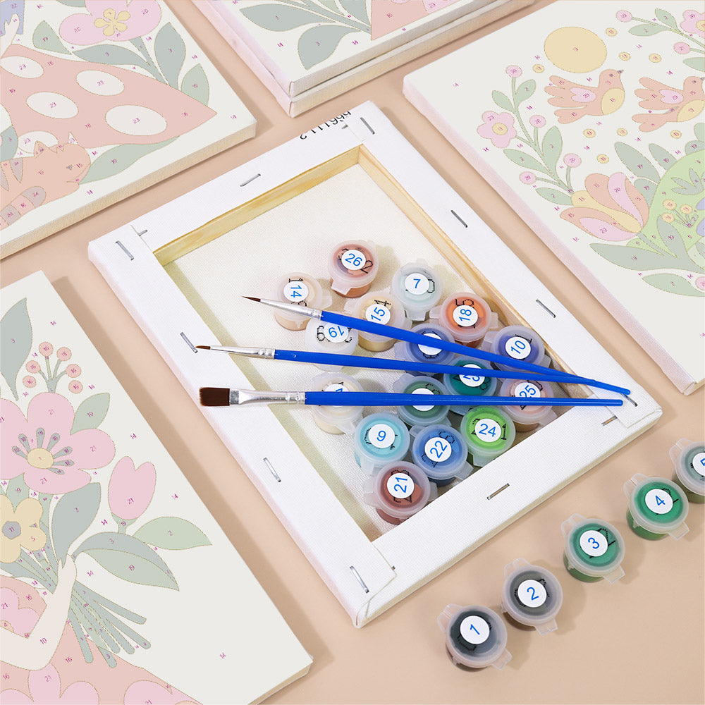 Numbered paint pots and brushes on a pre-stretched Folk Blossoms mini canvas