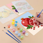 Filling in a Fresh Fruit Bowls mini canvas with numbered acrylic paints and a fine brush