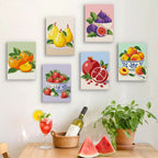 Six finished Fresh Fruit Bowls mini paintings hung on a wall above a table