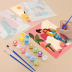 Filling in a Friendship Hugs mini canvas with numbered acrylic paints and a fine brush