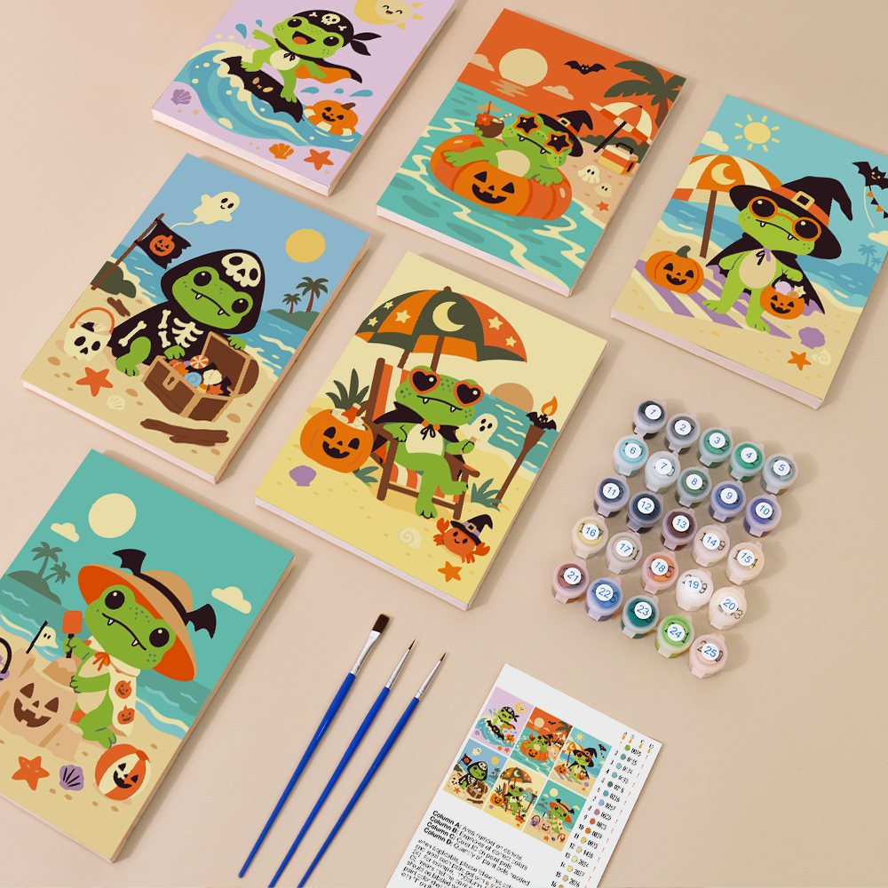 Painting one of the Frog Beach Halloween designs next to a stack of mini canvases