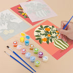Filling in a Fruit & Flower Jugs mini canvas with numbered acrylic paints and a fine brush