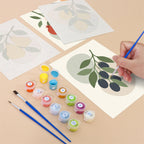 Filling in a Fruit Branches mini canvas with numbered acrylic paints and a fine brush