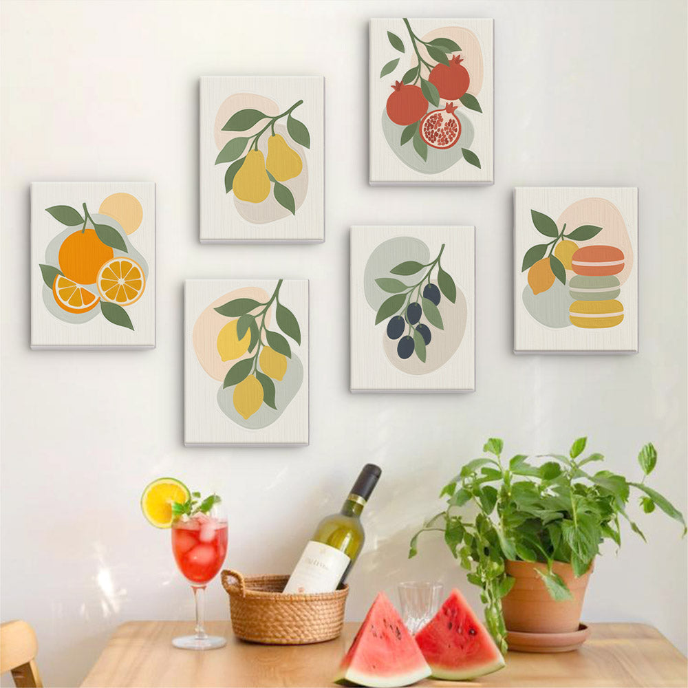 Six finished Fruit Branches mini paintings hung on a wall above a table