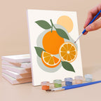 Painting a Fruit Branches mini canvas propped up beside numbered acrylic paints