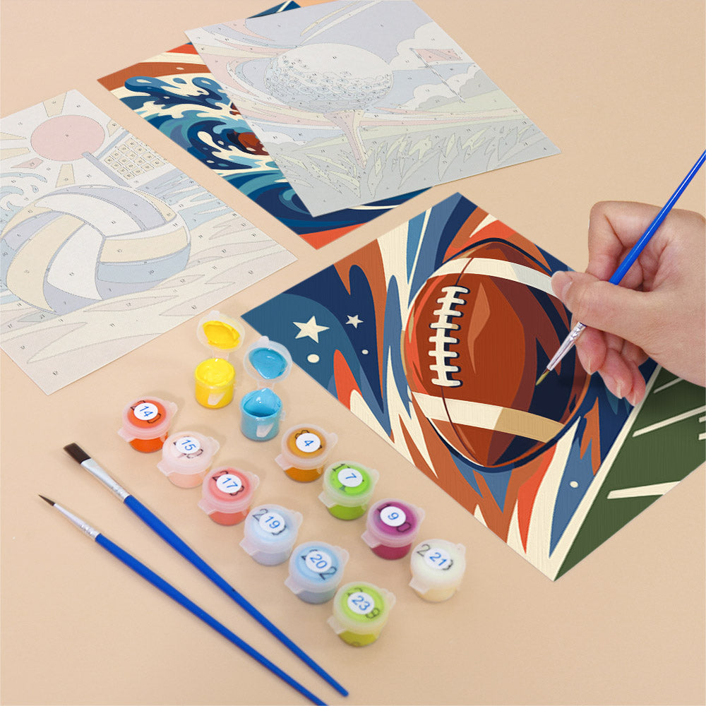 Filling in a Game On mini canvas with numbered acrylic paints and a fine brush