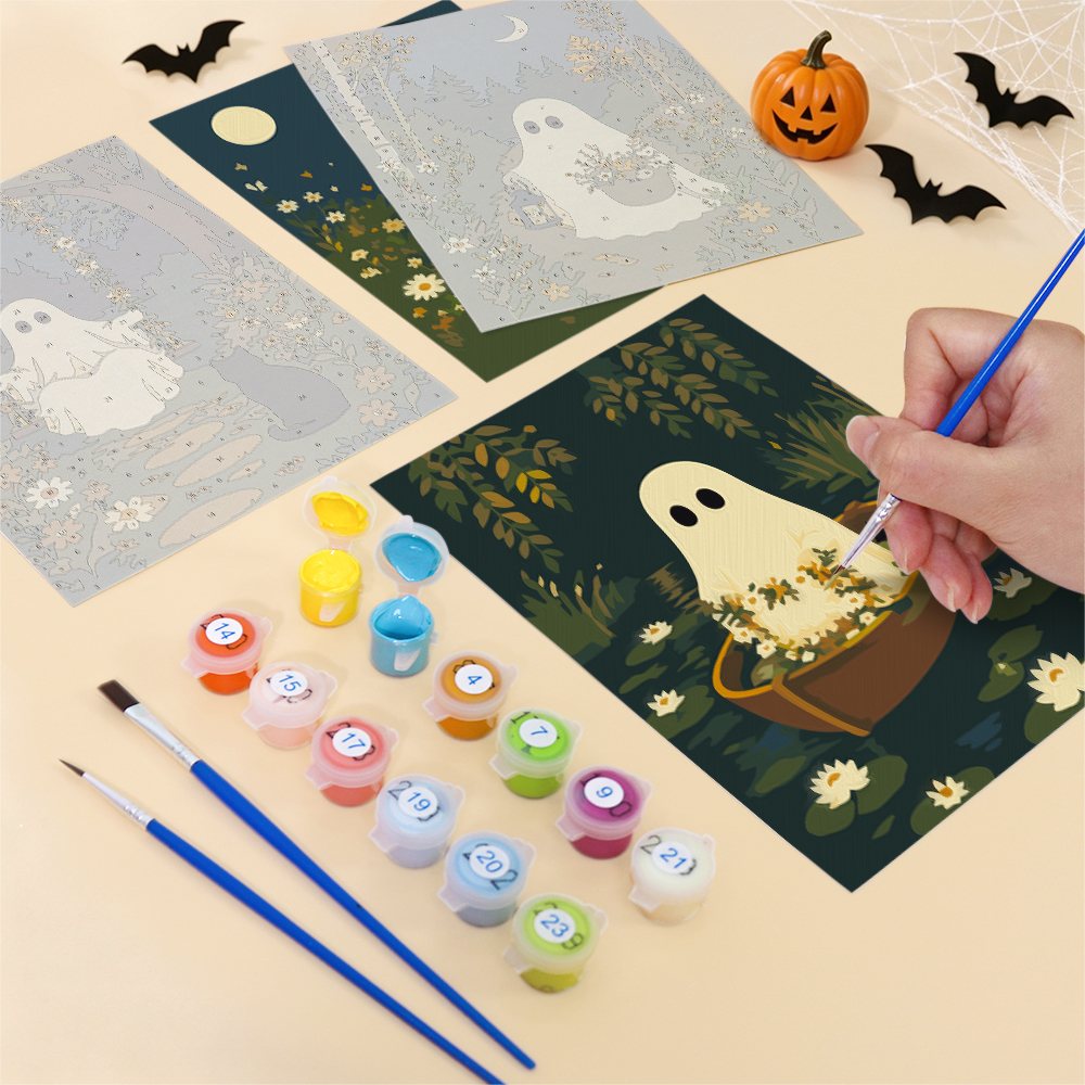 Filling in a Garden Ghosts mini canvas with numbered acrylic paints and a fine brush