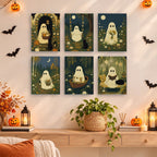 Garden Ghosts mini paintings displayed as a gallery wall in a sunny kitchen