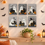 Ghostly Cauldrons mini paintings displayed as a gallery wall in a sunny kitchen