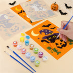 Filling in a Ghosts in Witch Hats mini canvas with numbered acrylic paints and a fine brush