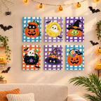 Six finished Gingham Halloween mini paintings hung on a wall above a table