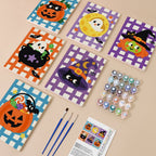 Gingham Halloween mini paint by numbers kit with six numbered canvases, acrylic paints, brushes and layout