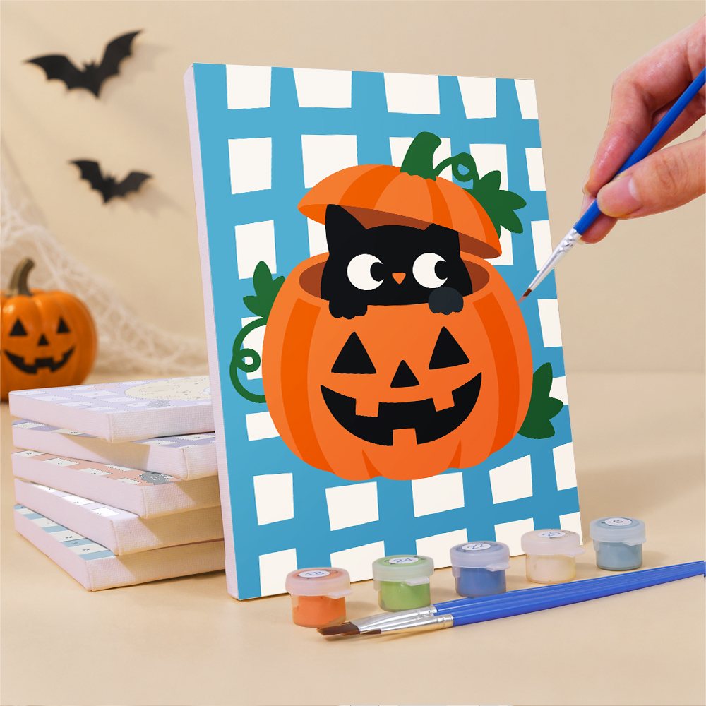 Painting a Gingham Halloween mini canvas propped up beside numbered acrylic paints