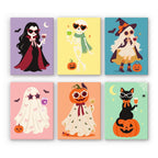 Glam Ghouls mini paint by numbers set: six glamorous Halloween characters in sunglasses on pastel backgrounds, including a vampire, skeleton, witch, ghost, pumpkin and black cat