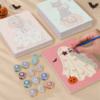 Numbered paint pots and brushes on a pre-stretched Glam Ghouls mini canvas