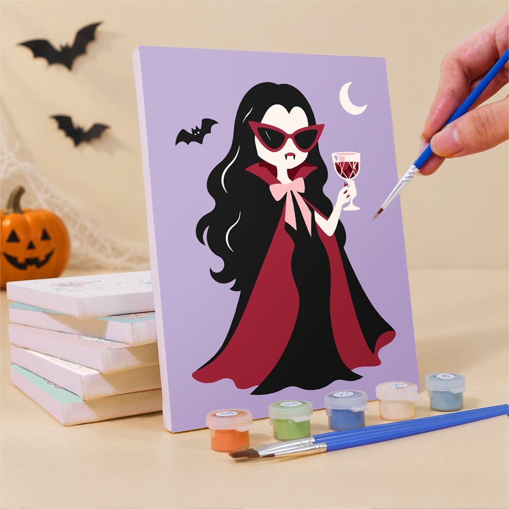 Glam Ghouls mini canvas shown rolled without a frame and pre-stretched on a frame