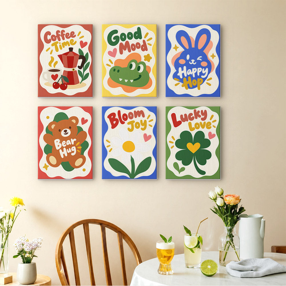 Good Mood Club mini paintings displayed as a gallery wall in a sunny kitchen