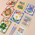 Good Mood Club mini paint by numbers kit with six numbered canvases, acrylic paints, brushes and layout