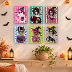 Painting a Gothic Glam Girls mini canvas propped up beside numbered acrylic paints