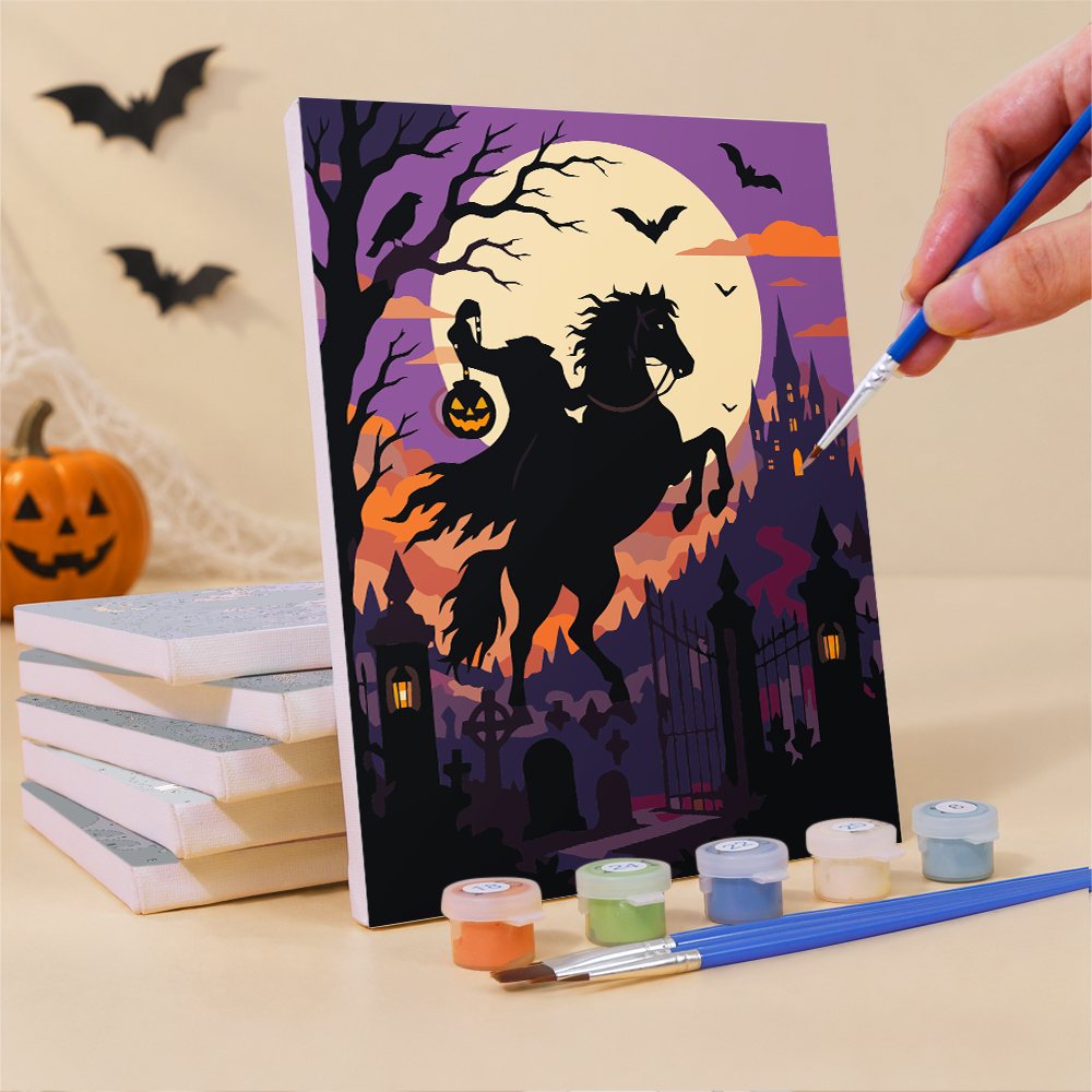 Painting a Gothic Twilight Tales mini canvas propped up beside numbered acrylic paints