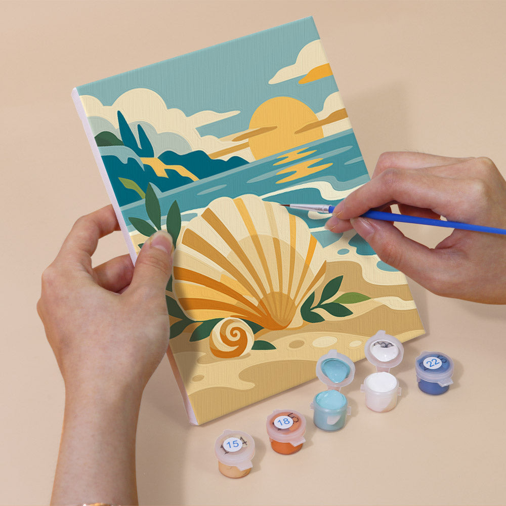 Hand holding a Greek Myths mini canvas while painting the details
