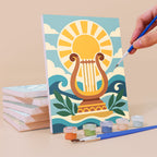 Painting a Greek Myths mini canvas propped up beside numbered acrylic paints