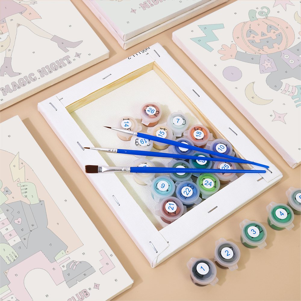 Numbered paint pots and brushes on a pre-stretched Groovy Monster Club mini canvas