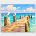 Gulls on the Pier paint by numbers kit of a wooden pier over turquoise water with two seagulls on the posts