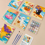 Painting one of the Halloween Beach Vacation designs next to a stack of mini canvases