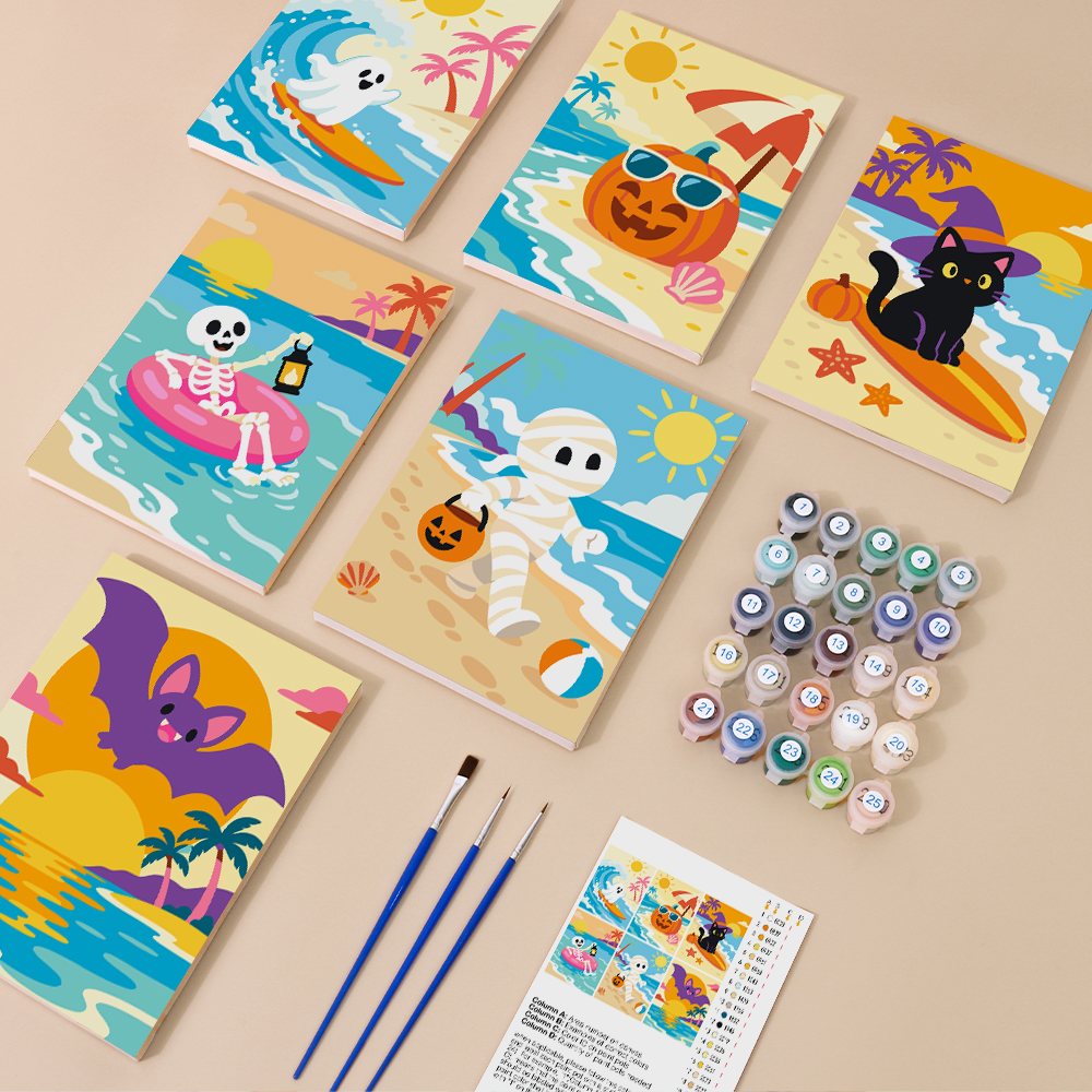 Painting one of the Halloween Beach Vacation designs next to a stack of mini canvases