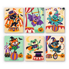 Halloween Circus Critters mini paint by numbers set: six animal circus performers, including a cat ringmaster, bat, octopus, fox, frog and crow under striped big tops