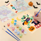 Filling in a Halloween Circus Critters mini canvas with numbered acrylic paints and a fine brush