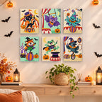 Halloween Circus Critters mini paintings displayed as a gallery wall in a sunny kitchen
