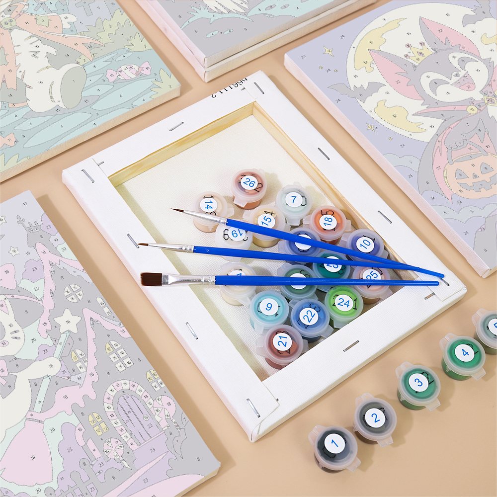 Numbered paint pots and brushes on a pre-stretched Halloween Costume Carnival mini canvas