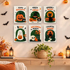 Halloween Greetings mini paintings displayed as a gallery wall in a sunny kitchen