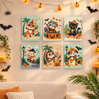 Six finished Halloween Jam Session mini paintings hung on a wall above a table
