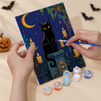 Numbered paint pots and brushes on a pre-stretched Halloween Night Adventures mini canvas