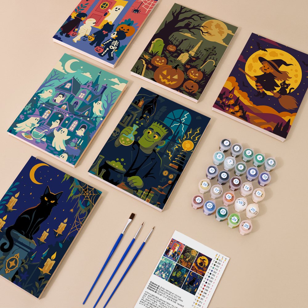 Painting one of the Halloween Night Adventures designs next to a stack of mini canvases