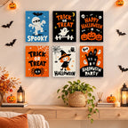 Halloween Party Signs mini paintings displayed as a gallery wall in a sunny kitchen