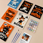 Halloween Party Signs mini paint by numbers kit with six numbered canvases, acrylic paints, brushes and layout