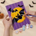 Numbered paint pots and brushes on a pre-stretched Halloween Party Stripes mini canvas