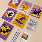 Painting one of the Halloween Party Stripes designs next to a stack of mini canvases
