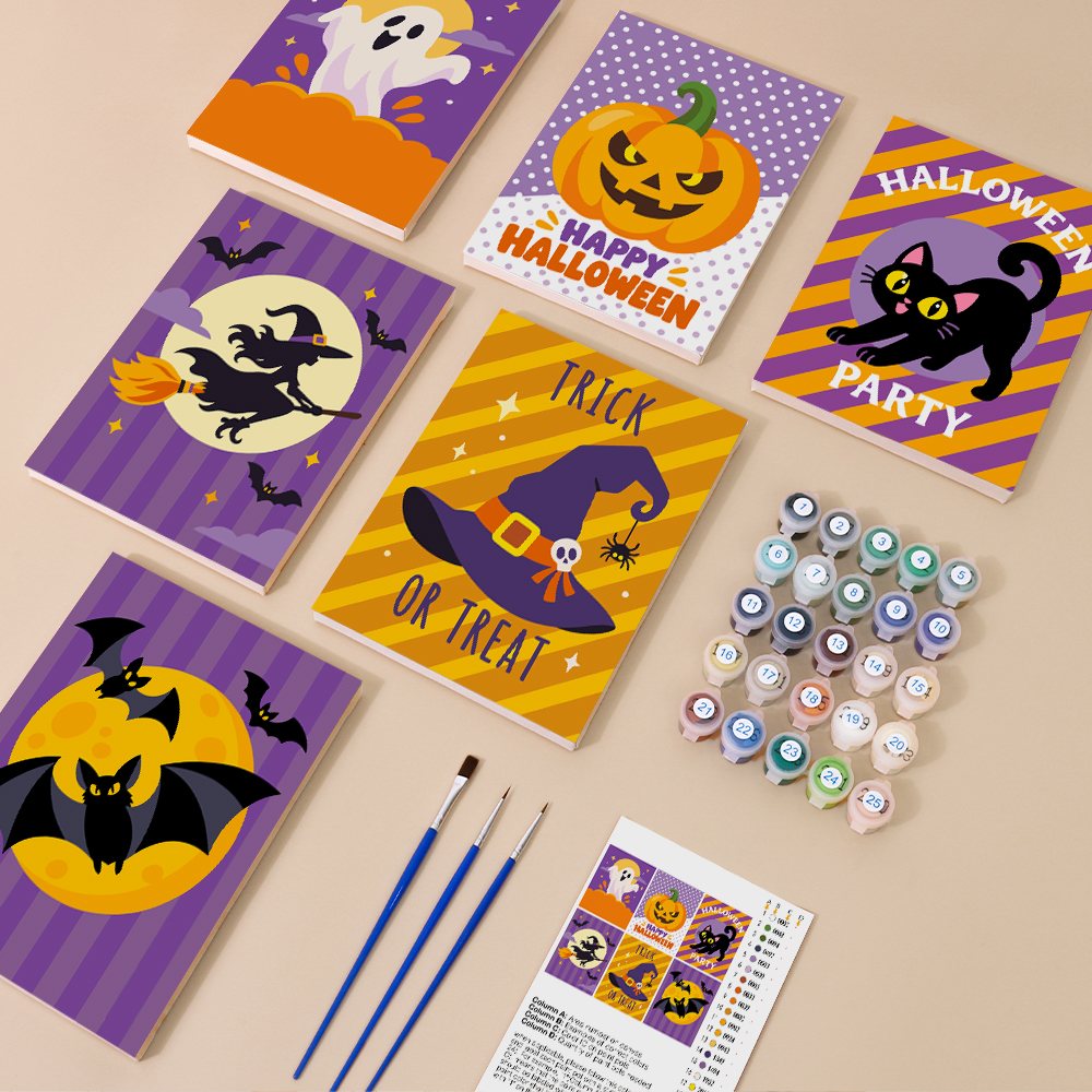 Painting one of the Halloween Party Stripes designs next to a stack of mini canvases