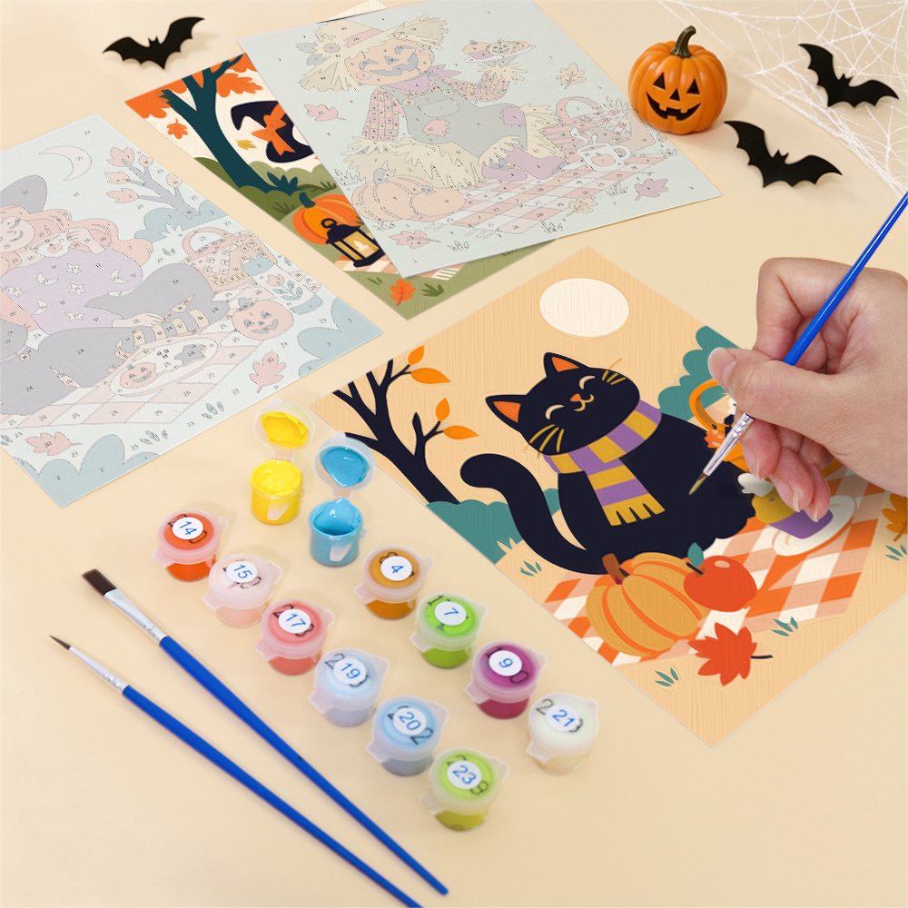 Filling in a Halloween Picnic Party mini canvas with numbered acrylic paints and a fine brush