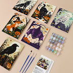 Painting one of the Halloween Woodland Creatures designs next to a stack of mini canvases